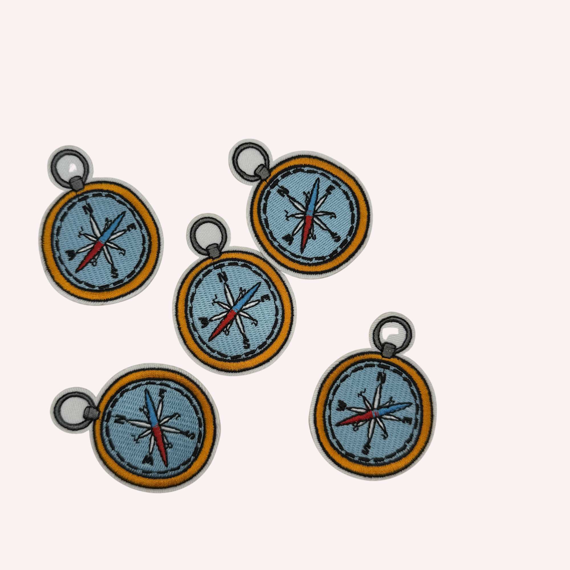 Compass Iron-On Patch – Light Blue with Orange Rim (2.5”)